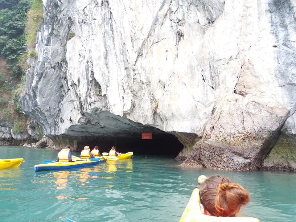 Entering the water caves on the kayaks.