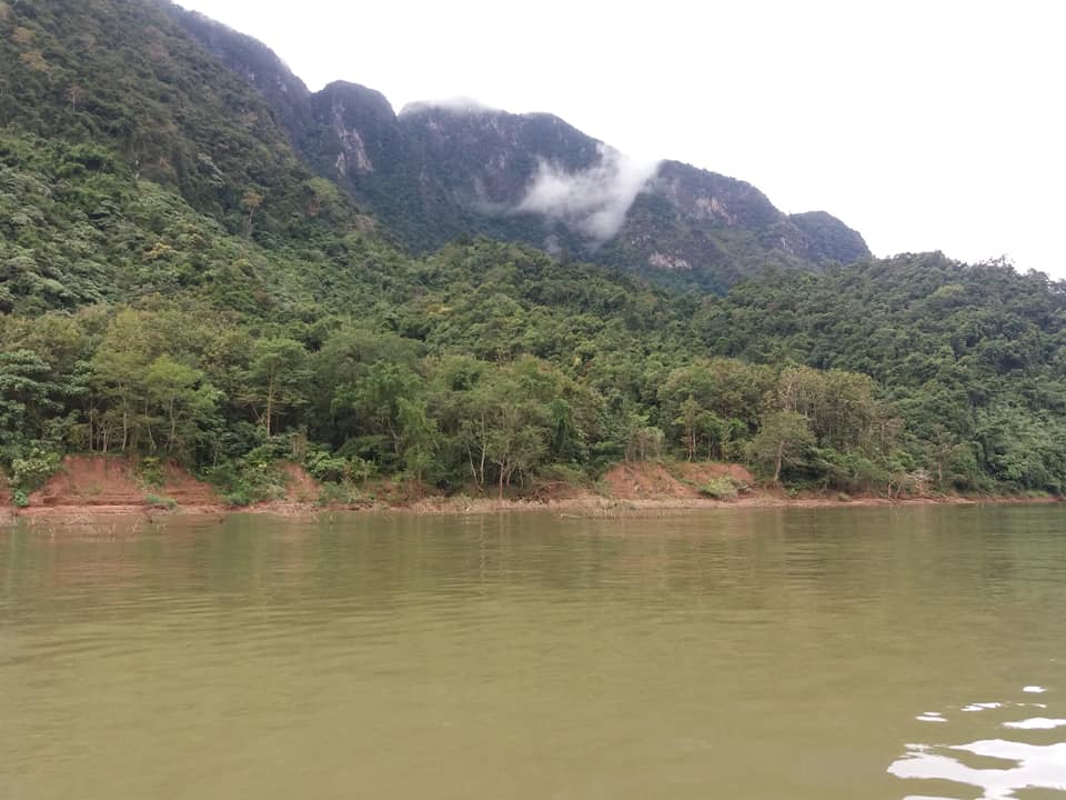 Heading up the Nam Ouu river towards Muang Ngoy.