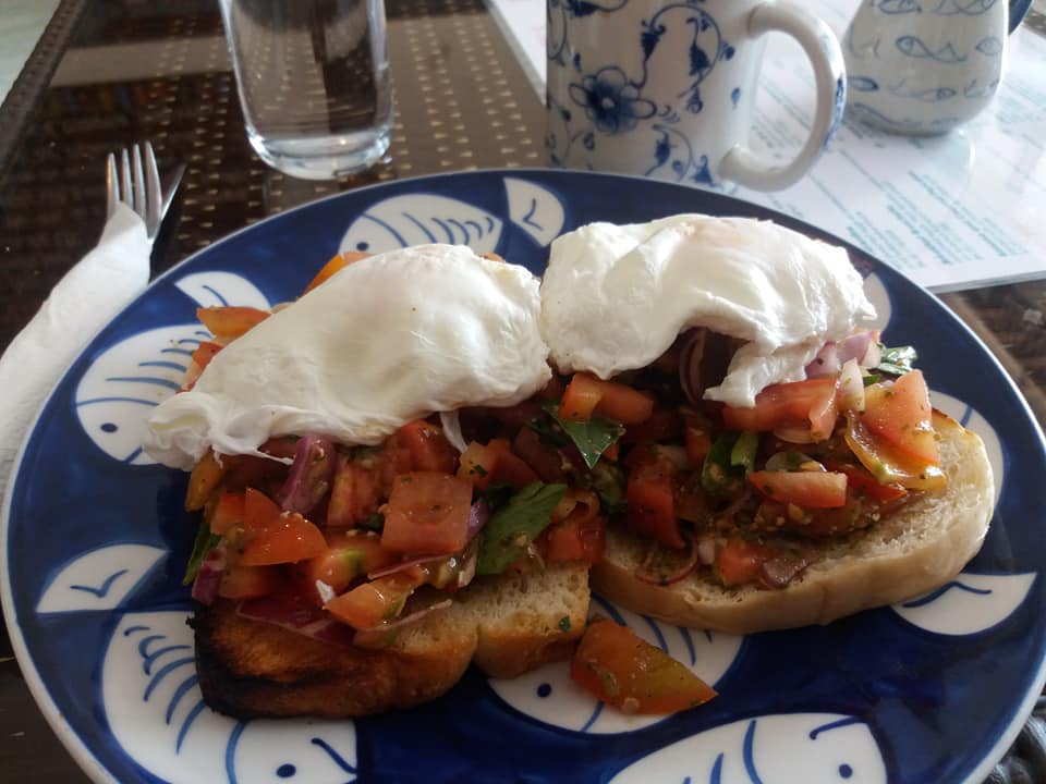 Bruschetta with poached eggs at Epic Arts Cafe.