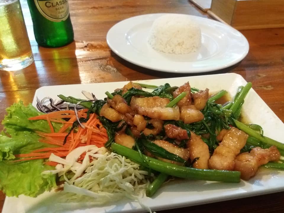 Crispy pork belly, water spinach and kale at Wan Wan Mookata, Koh Lipe.